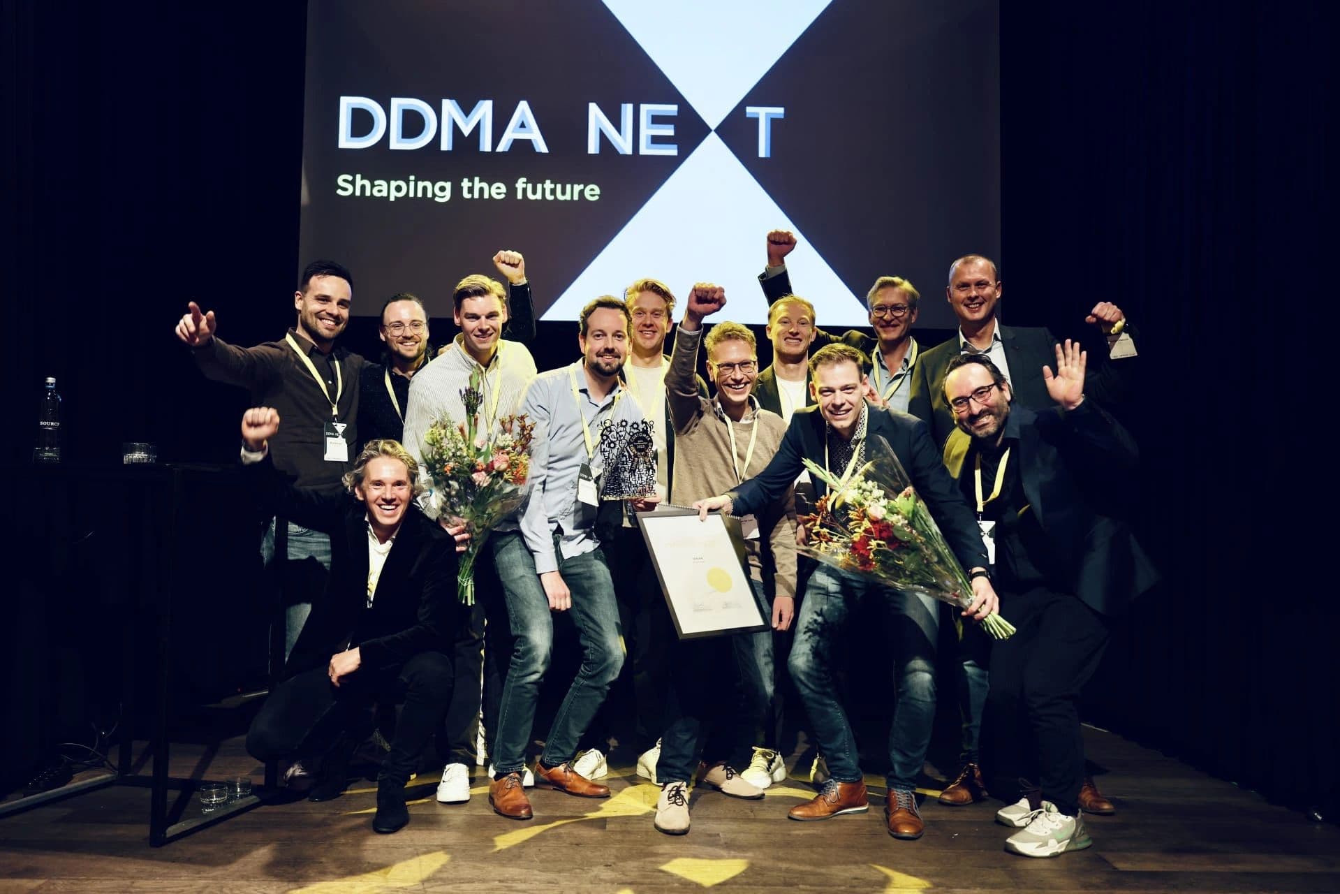 The Unive team on stage getting their award for being winners of the DDMA for Customer Data Awards